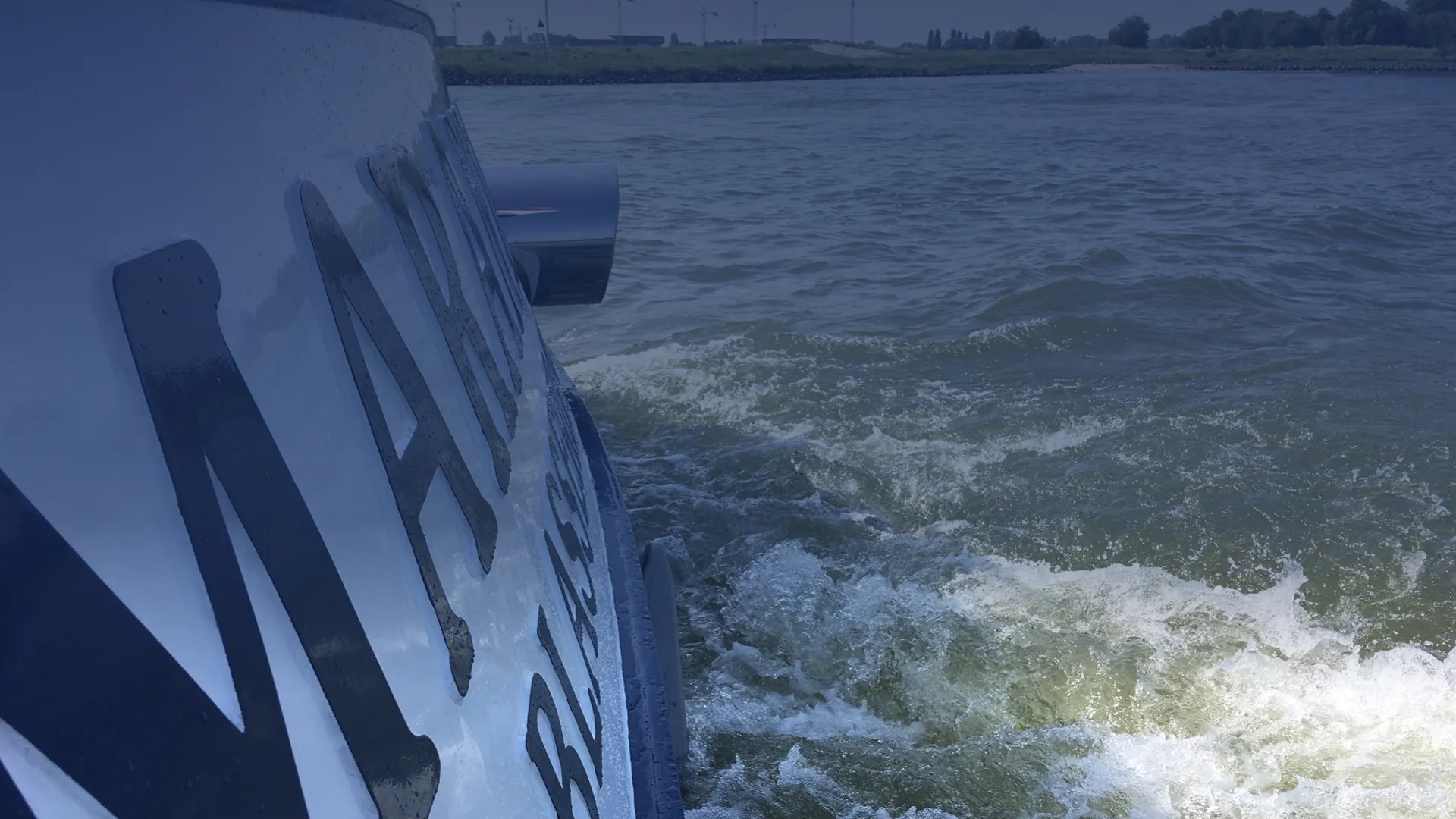 An exhaust pipe with clean emissions symbolizes the innovative NOx reduction products for ships.