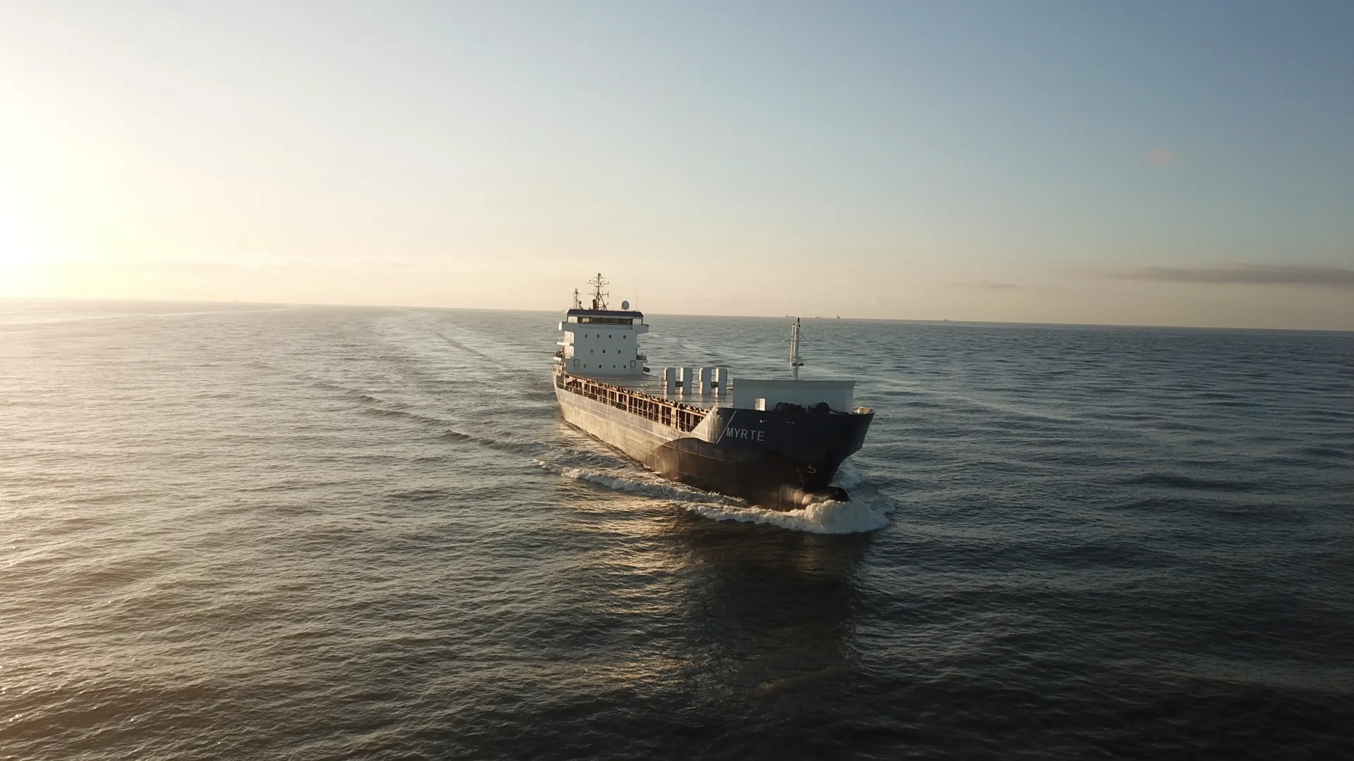 Coastal vessel Myrte with Pre-Swirl Stator for fuel savings and CO2 reduction, sailing on calm seas.