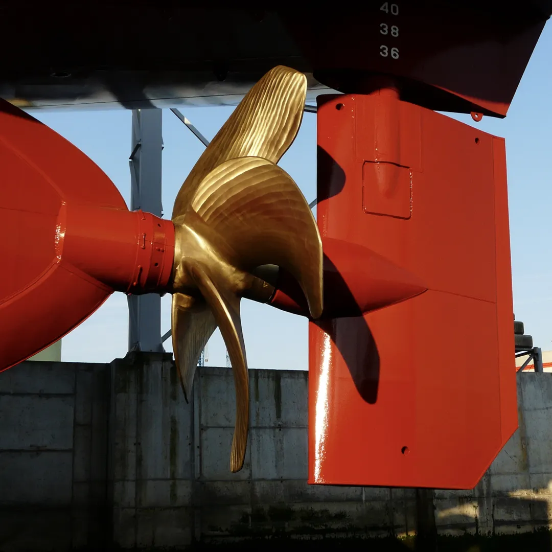 An example of a ship rudder type is a Twisted Rudder with Bulb, as shown in this image.