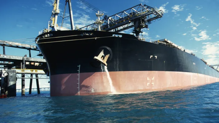 Ship discharges treated ballast water using a sustainable alternative technique for ballast water management.