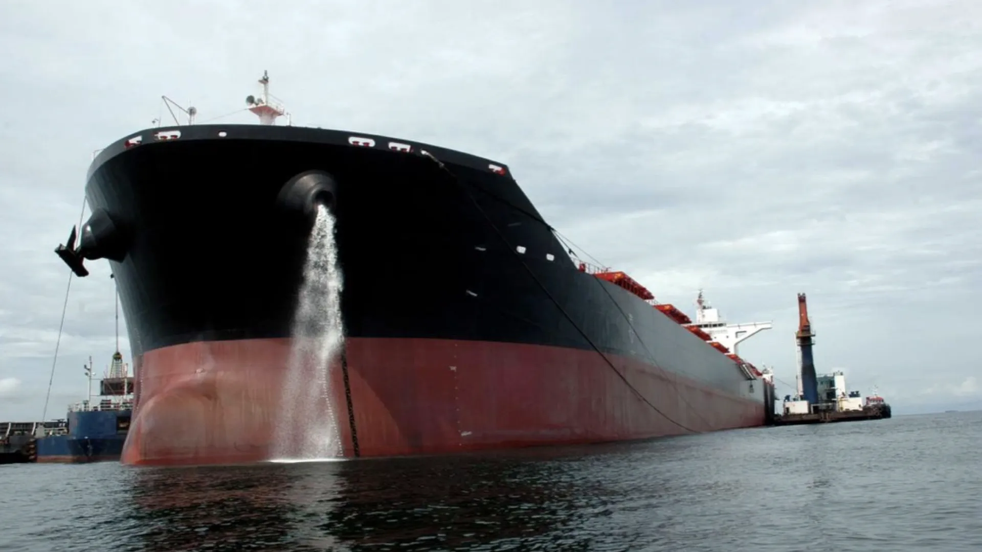 This ship is discharging ballast water using a UV-based BWTS, compliant with the U.S. Coast Guard (USCG) standards.